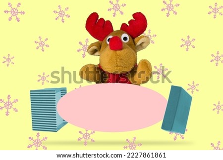 open package, paper falls out of the package as copy space, above the paper is a reindeer, creative holiday concept and space for a nice holiday message