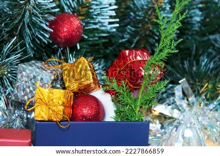 Wrapped gifts under a Christmas tree with copyspace. Christmas holiday picture with copyspace