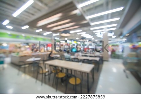 abstract blurred people in food center and coffee shop