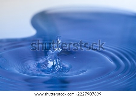 Water Drop with Ripples on water surface