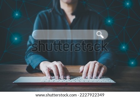 Technology of search engine optimization, SEO. Female hand using computer keyboard to search for information. Internet browsing concept, online networking. Front view photo.