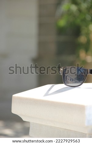 Sunglasses photo or image, summer vacation themed, warming up, tourism, tourist attraction, selective focus, noise effect, glitch effect