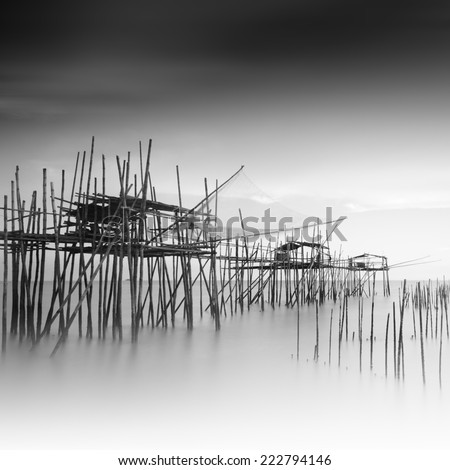 Long exposure and black and white image of "langgai"  , the traditional fishing medium at Malaysia .