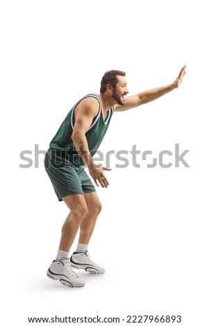 Man in a basketball jersey playing and gesturing with hand isolated on white background