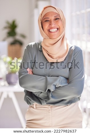 Success, leadership and portrait of Muslim woman in office with crossed arms, smile and confidence. Empowerment, professional and happy female worker standing in workspace for marketing startup Royalty-Free Stock Photo #2227982637