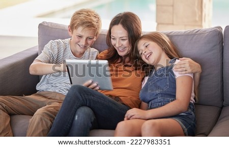 Relax, happy and tablet with mother and children on sofa for streaming, internet and social media app. Smile, subscription and movies with mom and kids in living room for family home for cartoon