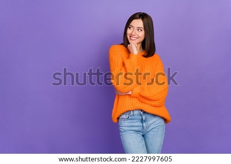 Photo of positive pretty girl arm touch chin toothy smile look empty space isolated on violet color background