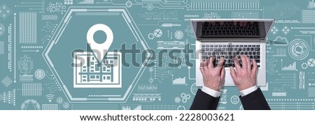 Top view of hands using laptop with symbol of gps concept