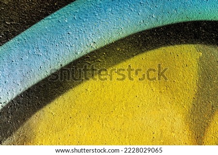 Beautiful bright colorful street art graffiti background. Abstract creative spray drawing fashion colors on the walls of the city. Urban Culture gradient texture, copyspace backdrop
