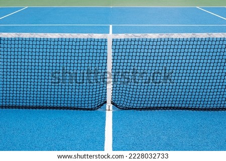 Blue Tennis court with black net abstract background