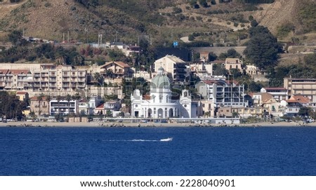 Church and homes in City by the Sea. Messina, Sicilia, Italy. Sunny Morning.