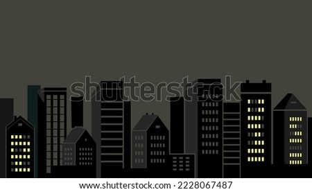 Blackout concept. Power outage in the city. Houses on the dark background. Destruction by rocket attacks of electric networks of Ukraine. Russian aggression. Royalty-Free Stock Photo #2228067487