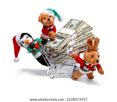Santa's helpers with a shopping cart full of money. Funny Christmas concept 