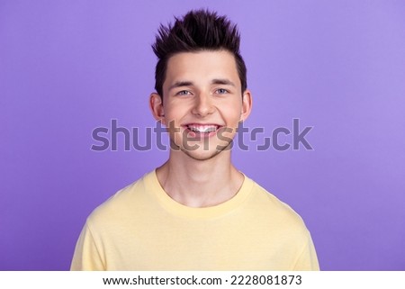 Happiness. Portrait of young cheerful man in casual cloth smiling isolated over bright background.