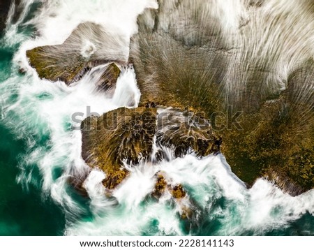 Waves crashing over the rocks