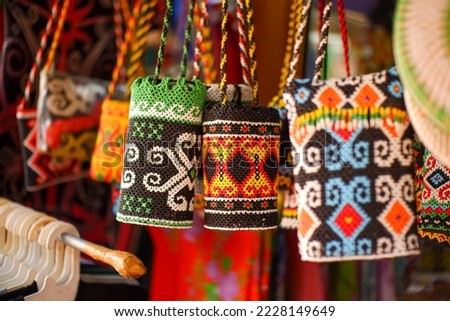 bags made by the Dayak tribe of Kalimantan, Indonesia, which are in great demand by tourists Royalty-Free Stock Photo #2228149649