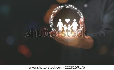 hand protecting family,family and property security concept,

symbol of life insurance,health and financial confidence,protecting and caring for loved ones,planning and risk management Royalty-Free Stock Photo #2228159175