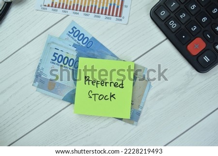 Concept of Preferred Stock write on sticky notes isolated on Wooden Table.