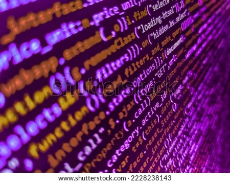 Binary digits code editing. Software technology background showing programming source code on computer screen. Antikythera Mechanical device. WWW software development. IT specialist workplace