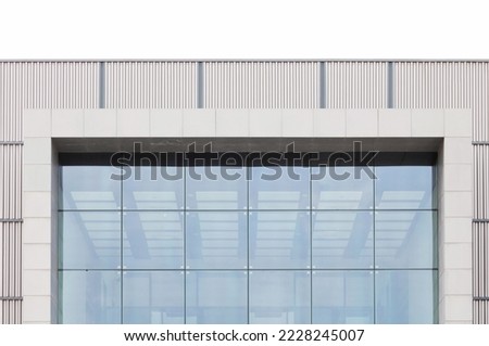 Contemporary architecture. Close up of a modern office building with a glass facade.