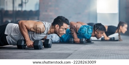 Men, woman and dumbbells in gym workout, training and fitness exercise for health wellness, strong biceps or abs muscles. Personal trainer, coach or weightlifting class friends with motivation goals Royalty-Free Stock Photo #2228263009