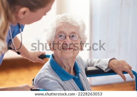 Disability, nursing and senior woman with a doctor for care, consultation and medical help at a hospital. Healthcare, communication and elderly patient in a wheelchair with a nurse in a home