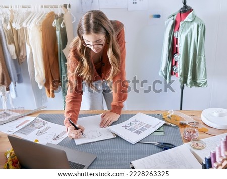 Design illustration, clothes designer and fashion employee working on creative design information. Textile, tailor and sewing planning of a woman planning a drawing, sketch and workshop studio job