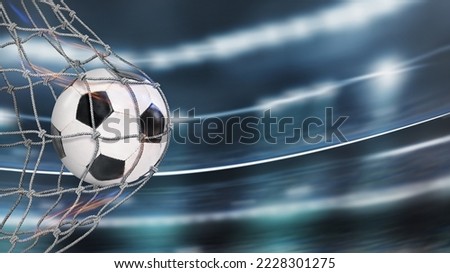  Soccer ball in goal in a big stadium. soccer net