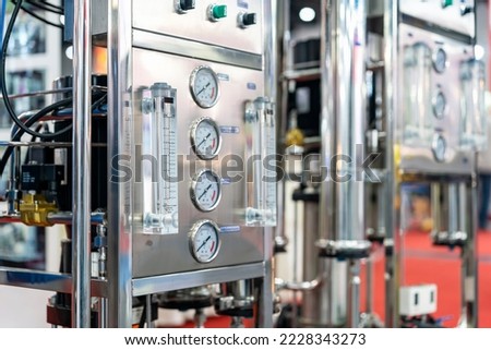 rotameter and pressure dial gauge measuring device for measure volumetric flow rate and pressure quantification of liquid or fluid in close tube Royalty-Free Stock Photo #2228343273