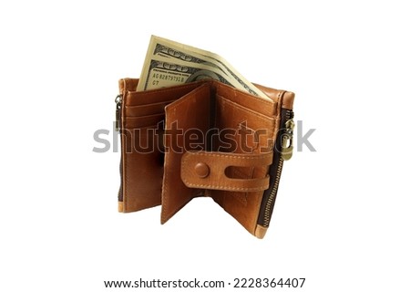 Leather wallet on a light background. Brown wallet.