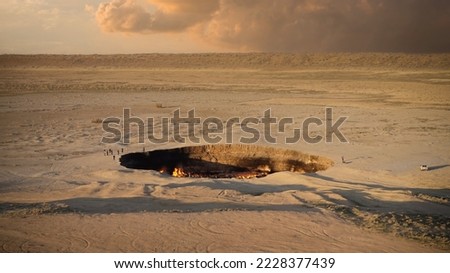 Darvaza gas crater, also known as the Gates of Hell. Panoramic view of the famous natural gas crater  in Turkmenistan that is still burning, decades after the crater collapsed during the Soviet era.  
