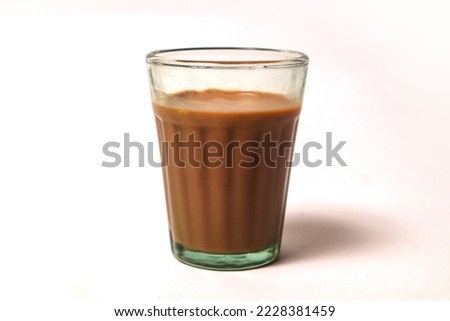 Fresh milk tea or Indian Kadak Chai. Royalty-Free Stock Photo #2228381459