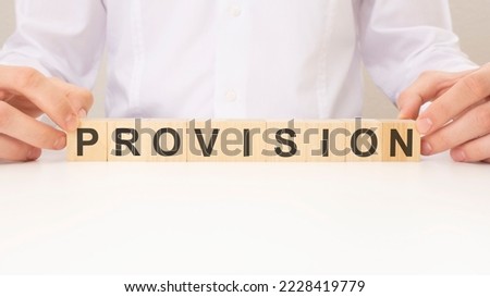 PROVISION word made with building blocks, business concept.