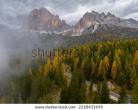 Dolomites, Passo Giau and Snake Road photographed with the drone during the foliage period Royalty-Free Stock Photo #2228432695