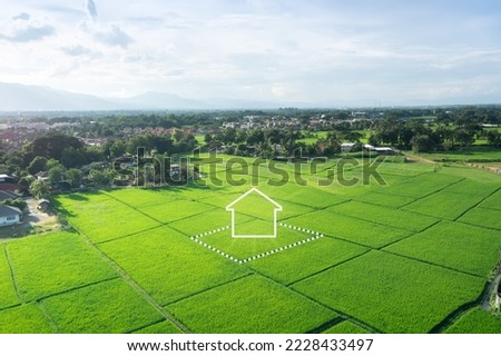 Land or landscape of green field in aerial view. Include agriculture farm, icon of residential, home or house building. Real estate or property for dream concept to build, construction, sale and buy.
