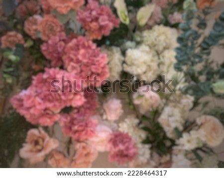 Blurred image of delicate colorful flowers.