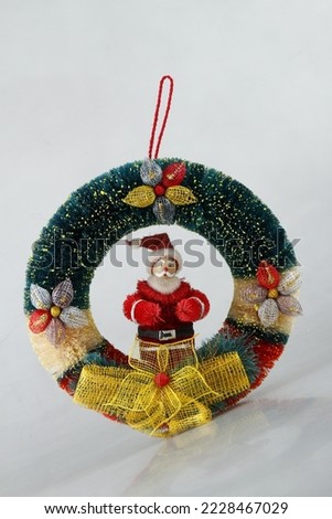 Santa Claus wreath Christmas tree ornament on a white background