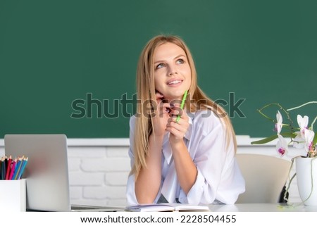 Portrait of cute attractive young woman student in university or high school college. Education, high school, university, learning and people concept.