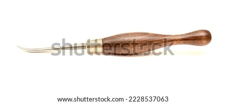 Curved burnisher tool used in engraving, isolated on white background
 Royalty-Free Stock Photo #2228537063