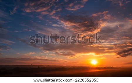 Evening or morning sky with stars and clouds, sunset or dawn. Abstract natural background. Royalty-Free Stock Photo #2228552855
