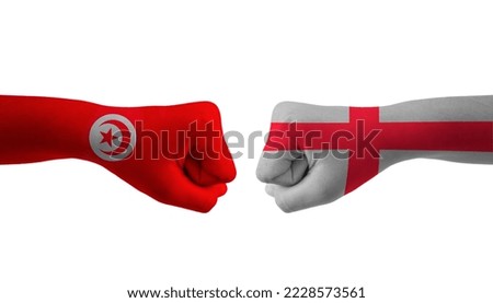 England VS Tunisia hand flag Man hands patterned football world cup Royalty-Free Stock Photo #2228573561