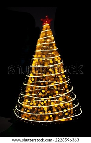 Blurred yellow Christmas tree lights with particles and circles on black isolated background. Design element. Defocused spruce with star. Overlay. New Year