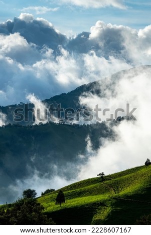 Scenic view of Andes mountains in a cloudy day, Manizales, Caldas, Antioquia, Colombia - stock photo