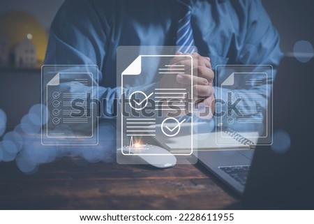 Businessman use a laptop to sign documents electronically online. Technology signing signatures electronic online. Reduce the use of corporate paper, Paperless, The digital technology of the future.