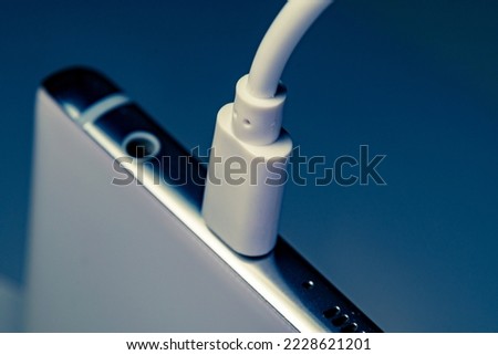 Scenes of charging a smartphone. Close-up image