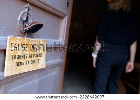 Open church. Sign on a the door.  France. 