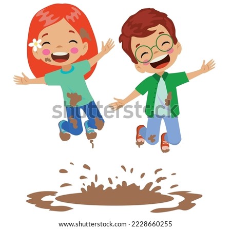 cute happy kids jumping in mud