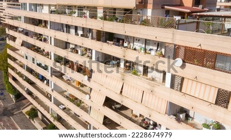 Aerial view of the facade of a condominium building