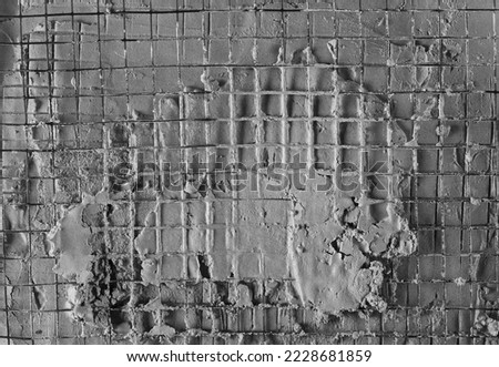 Cement reinforcement with wire mesh background and texture Royalty-Free Stock Photo #2228681859