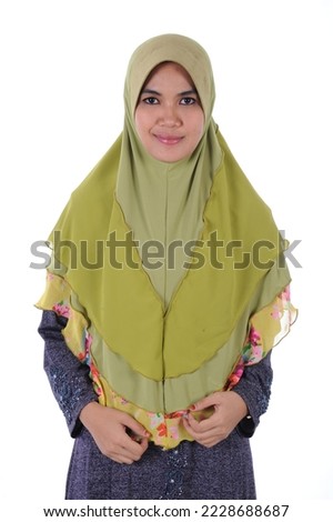 Attractive young woman wearing hijab. Beautiful Muslim girl wearing hijab. Muslim Hijab Fashion Portraiture.